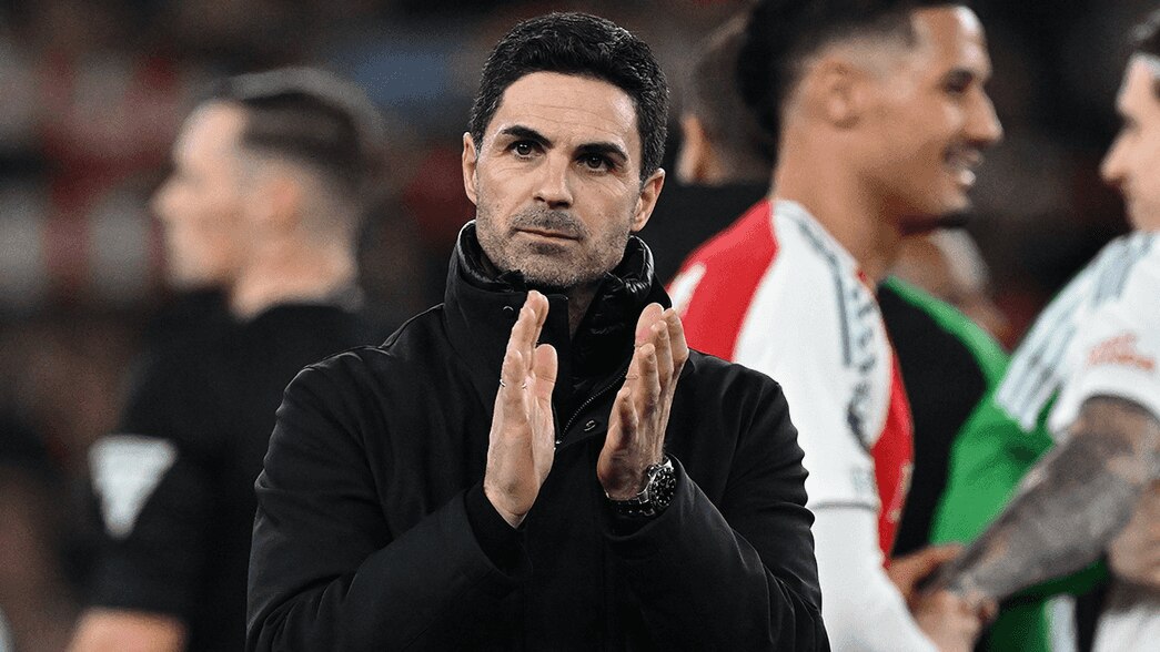 Mikel Arteta applauds the supporters